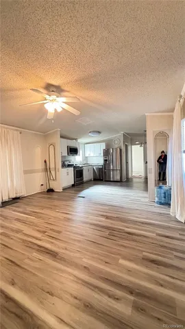 a view of a livingroom with furniture