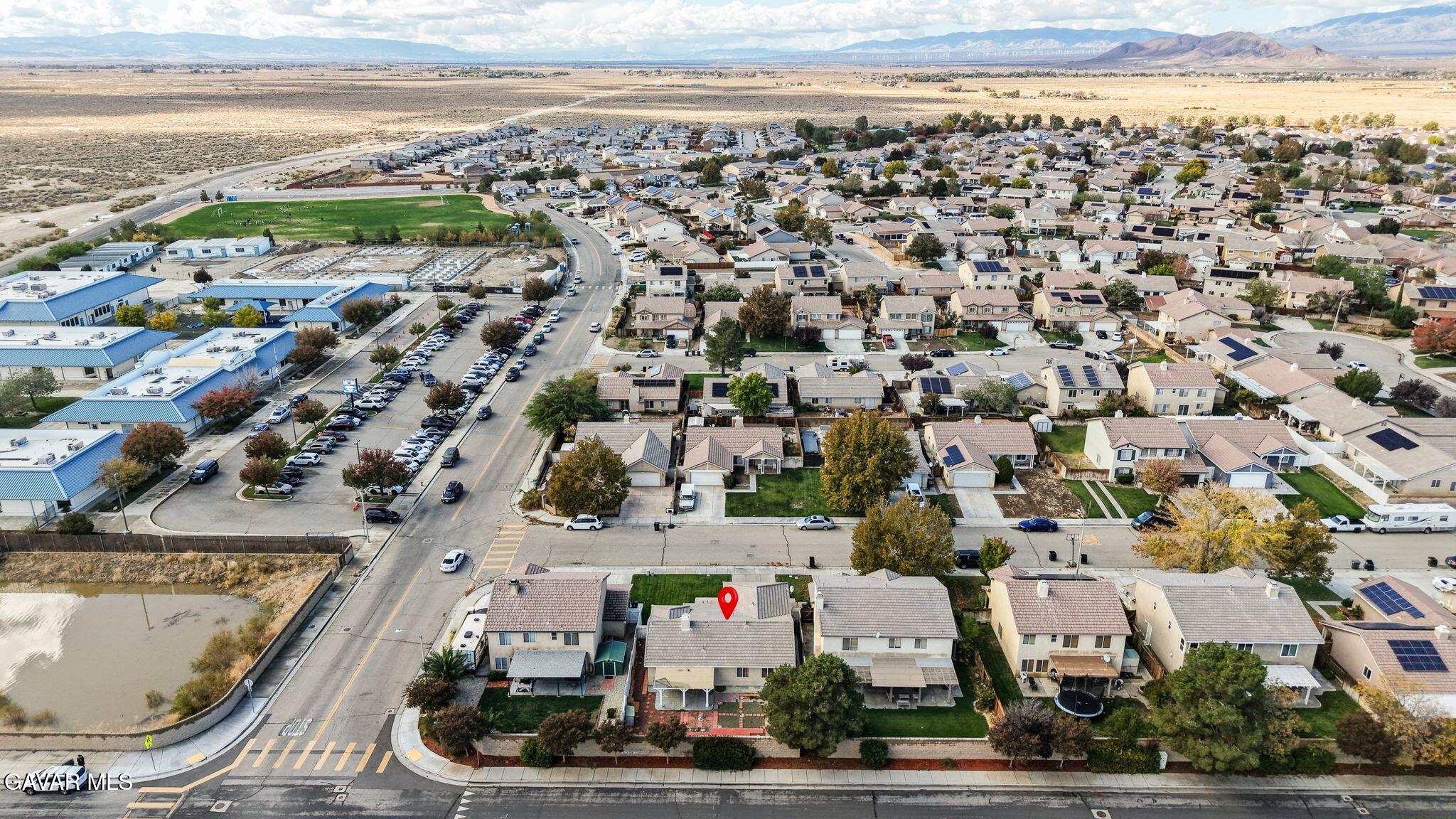 2108 Manchester Street Rosamond, CA 93560 - Photo 2 of 41 an aerial view of multiple house