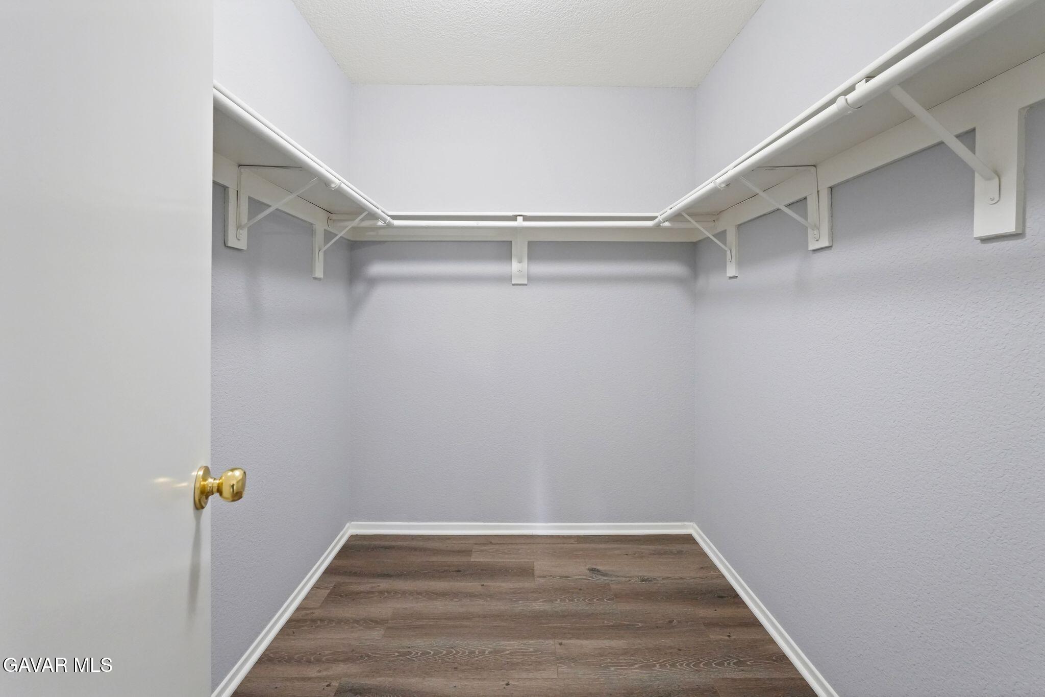 2108 Manchester Street Rosamond, CA 93560 - Photo 32 of 41 a view of an empty walk in closet