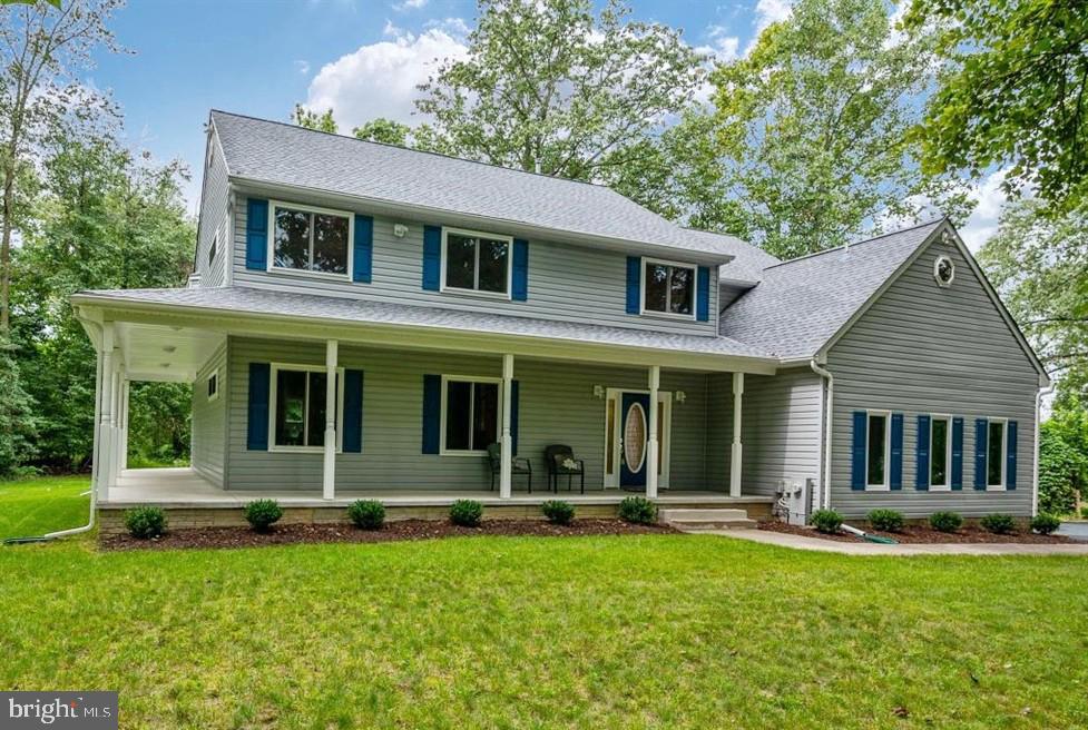 1451 Colony Road Pasadena, MD 21122 - Photo 1 of 48 Front Exterior With Concrete Wrap-Around Porch