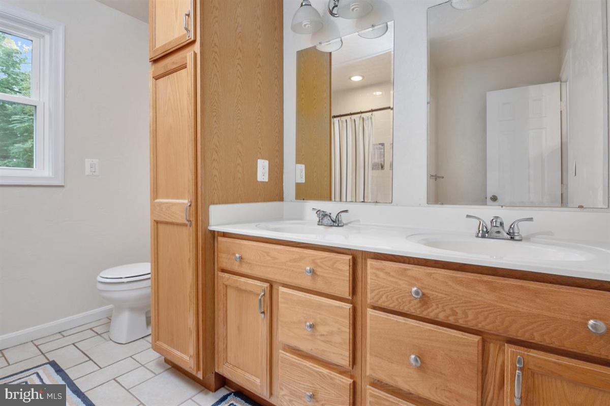 1451 Colony Road Pasadena, MD 21122 - Photo 22 of 48 Upper Level Hall Bathroom