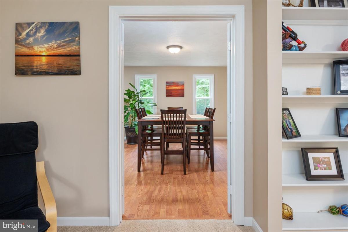 1451 Colony Road Pasadena, MD 21122 - Photo 26 of 48 Living Room View Toward Dining Room