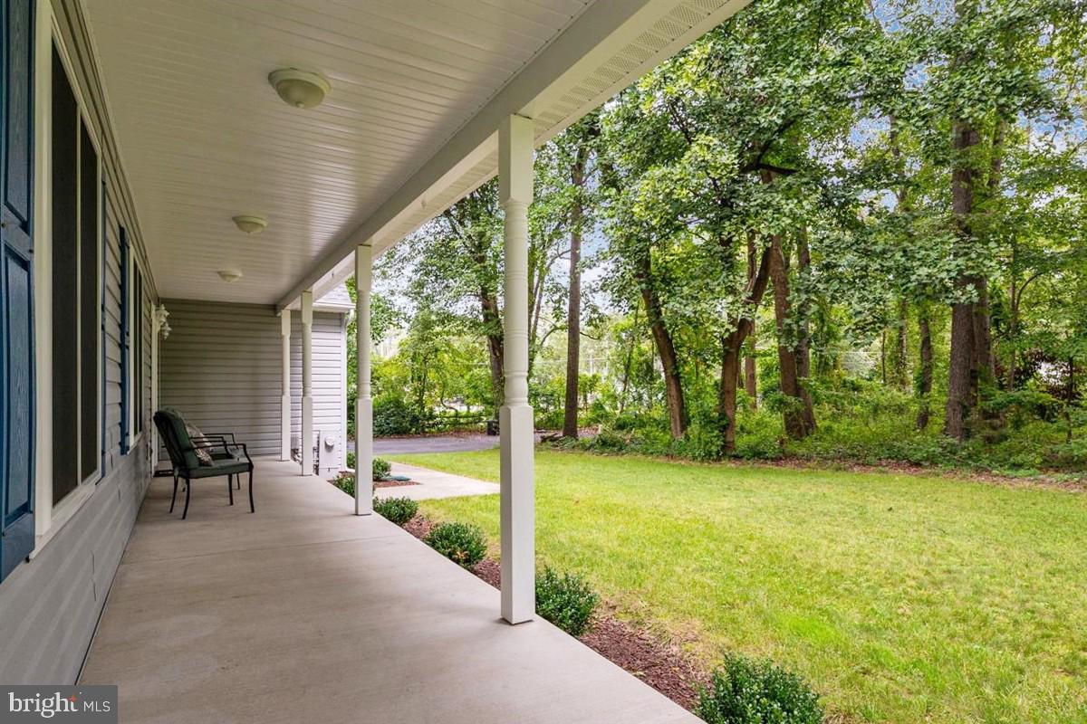 1451 Colony Road Pasadena, MD 21122 - Photo 34 of 48 Expansive, Concrete Front Porch