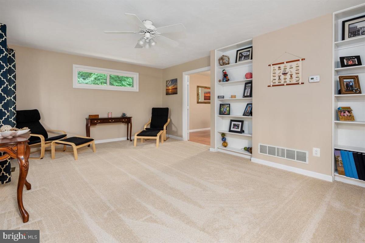1451 Colony Road Pasadena, MD 21122 - Photo 8 of 48 Living Room with Built-in Bookcases