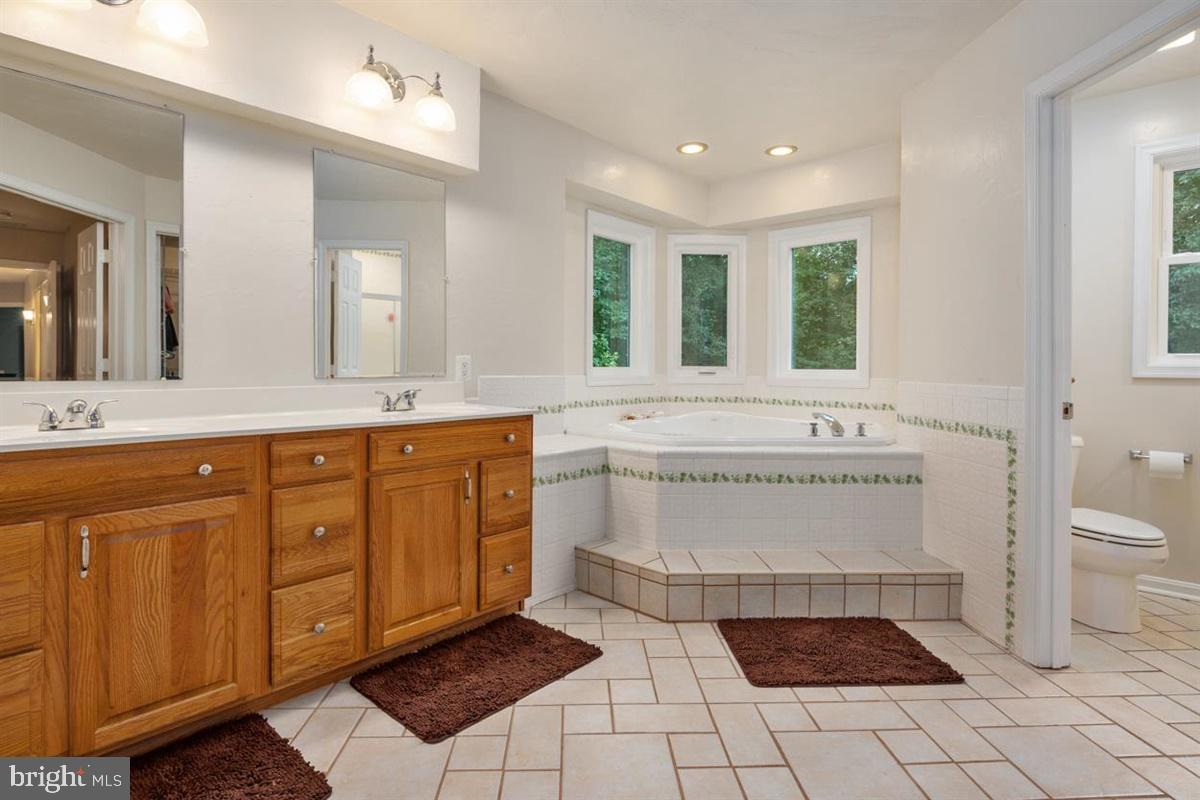 1451 Colony Road Pasadena, MD 21122 - Photo 9 of 48 Master Bathroom Retreat with Corner Soaking Tub