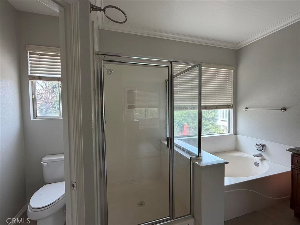 7162 Breno Place Rancho Cucamonga, CA 91701 - Photo 11 of 20 a bathroom with a sink toilet and shower