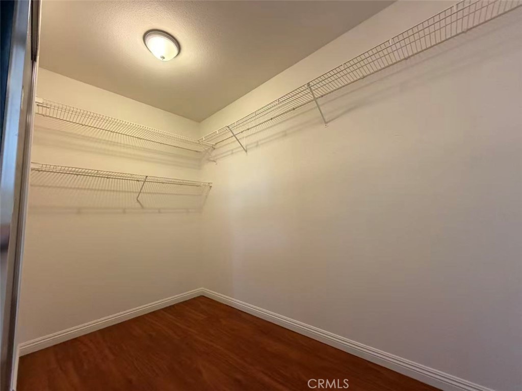 7162 Breno Place Rancho Cucamonga, CA 91701 - Photo 10 of 20 a view of a room with racks on the wall