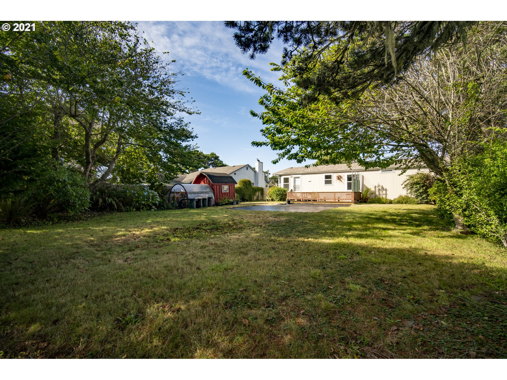 887 Jackson Avenue Southwest Bandon, OR 97411 - Photo 18 of 20 a view of a green field