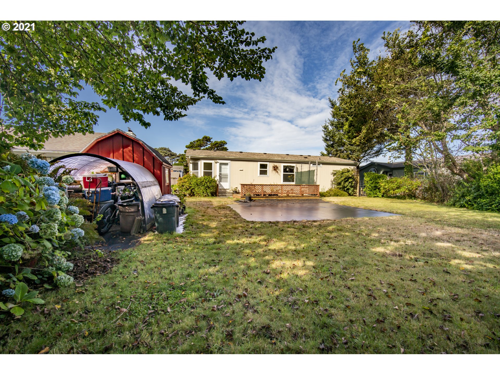 887 Jackson Avenue Southwest Bandon, OR 97411 - Photo 19 of 20 a view of swimming pool in front of residential houses with outdoor space