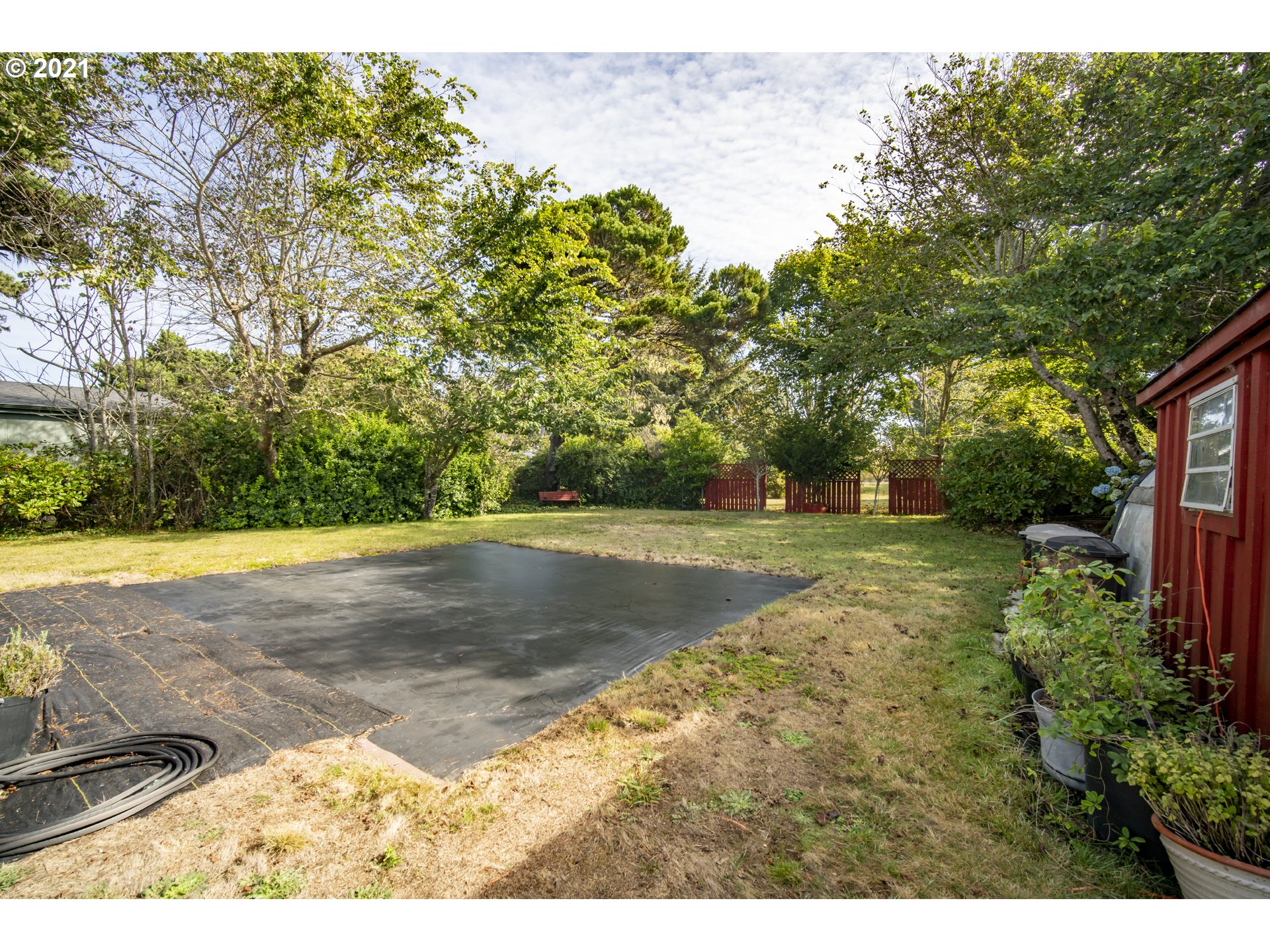 887 Jackson Avenue Southwest Bandon, OR 97411 - Photo 20 of 20 a view of a yard