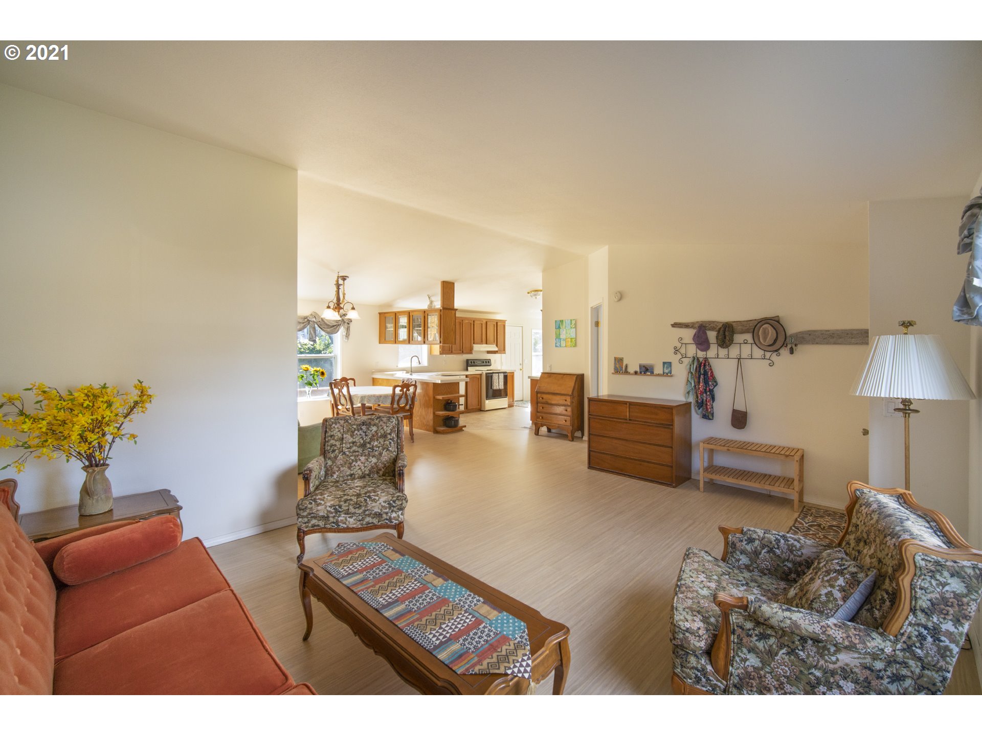 887 Jackson Avenue Southwest Bandon, OR 97411 - Photo 4 of 20 a living room with furniture and a couch