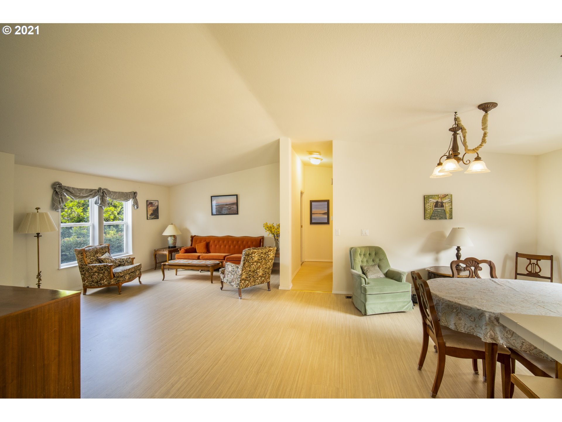 887 Jackson Avenue Southwest Bandon, OR 97411 - Photo 6 of 20 a living room with furniture and a couch