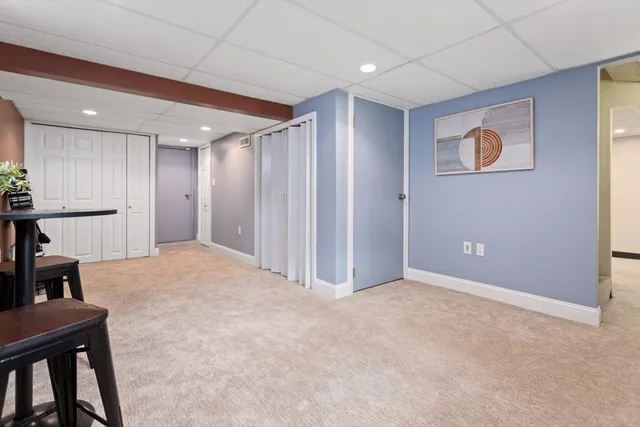 a view of a livingroom with furniture and cabinet