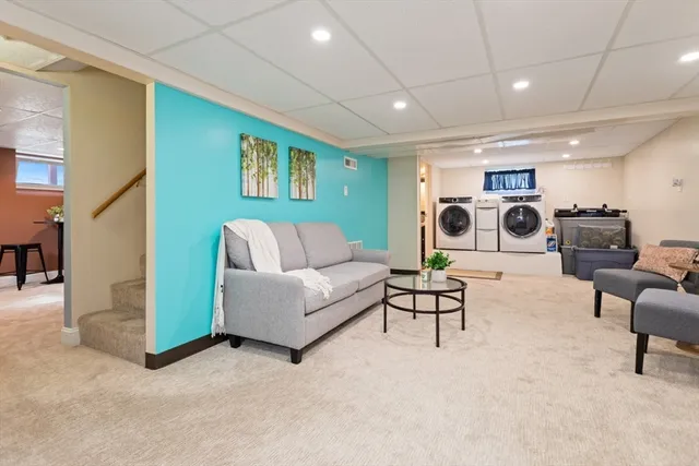 a living room with furniture and a table