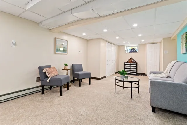 a living room with furniture and a couch