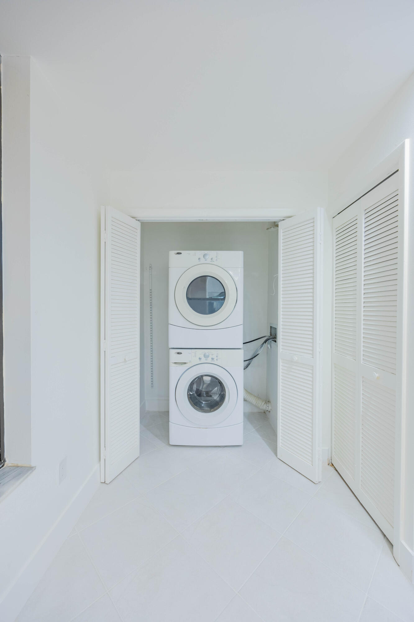 7520 La Paz Boulevard, Unit 104 Boca Raton, FL 33433 - Photo 39 of 56 a view of a utility room with toys