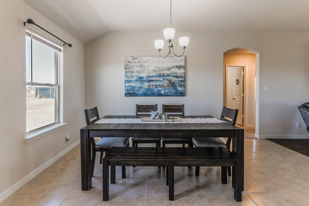 120 Hillcrest Lane Decatur, TX 76234 - Photo 12 of 33 a view of a dining room with furniture window and wooden floor