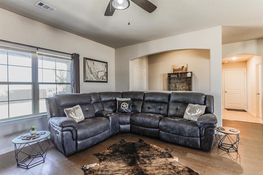 120 Hillcrest Lane Decatur, TX 76234 - Photo 13 of 33 a living room with furniture and a large window