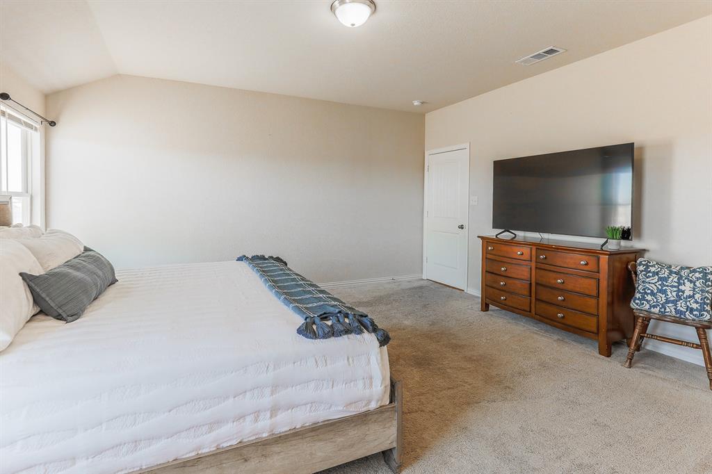 120 Hillcrest Lane Decatur, TX 76234 - Photo 24 of 33 a bedroom with a bed and television