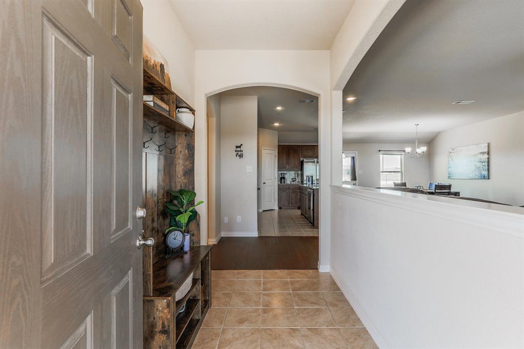 120 Hillcrest Lane Decatur, TX 76234 - Photo 6 of 33 a view of a kitchen and dining room