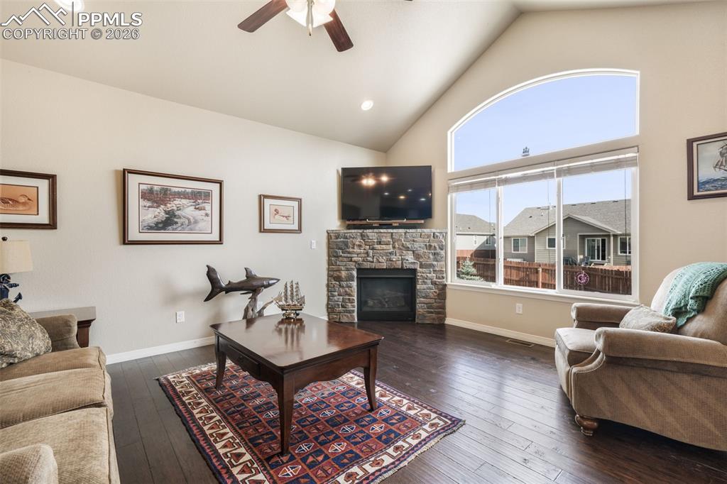 10269 Prairie Ridge Court Peyton, CO 80831 - Photo 19 of 50 Main living room with fireplace