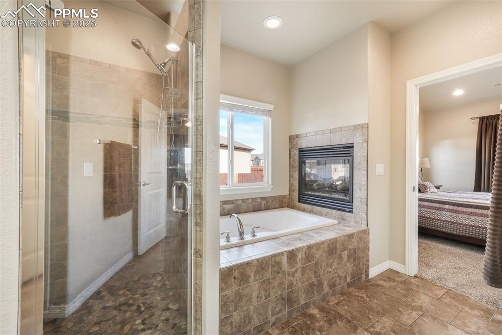 10269 Prairie Ridge Court Peyton, CO 80831 - Photo 30 of 50 Master bathroom with walk-in shower