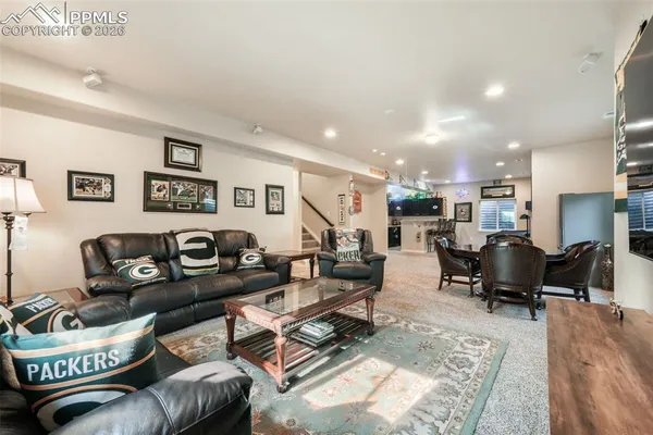 a living room with furniture and a table