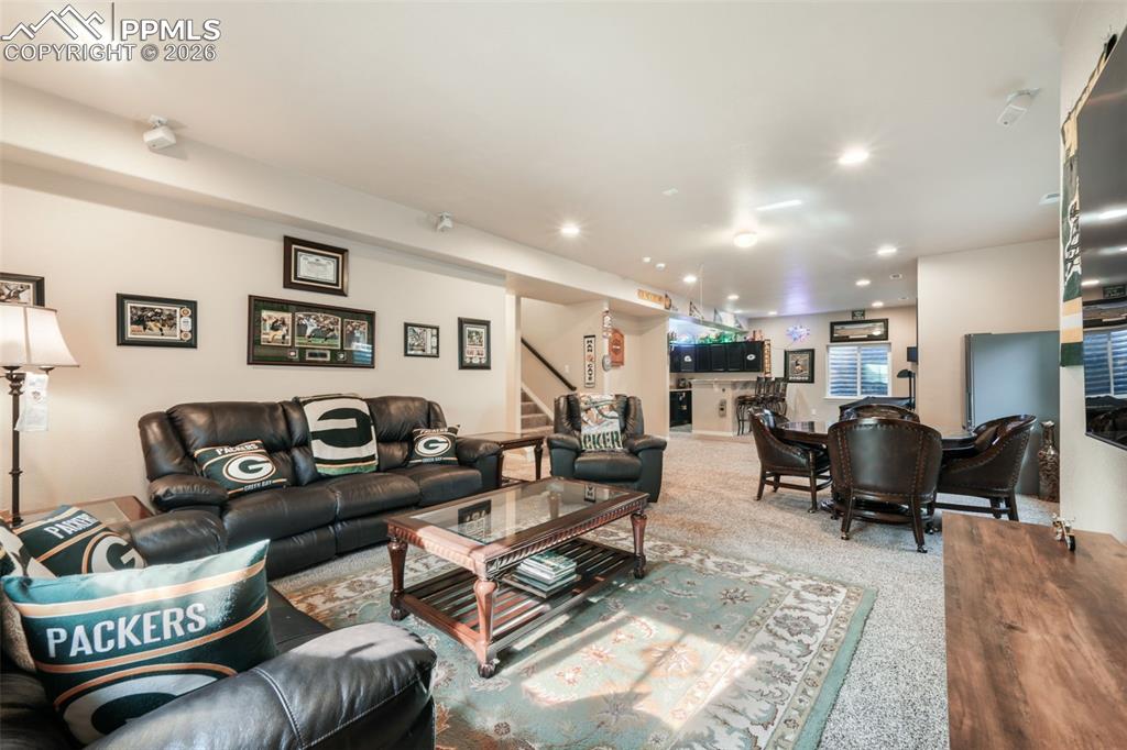 10269 Prairie Ridge Court Peyton, CO 80831 - Photo 32 of 50 Basement family room