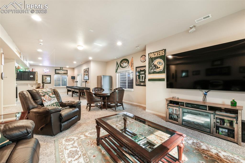 10269 Prairie Ridge Court Peyton, CO 80831 - Photo 34 of 50 Basement family room