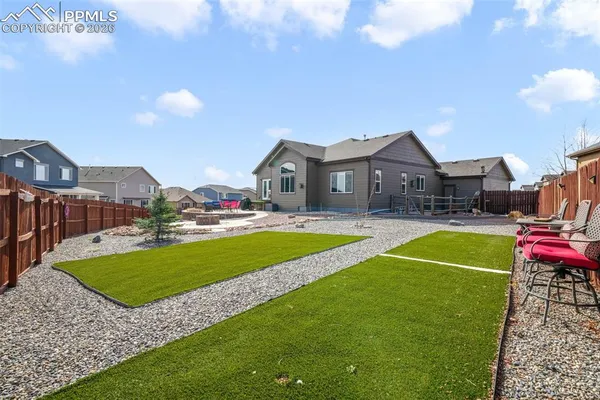 a view of a house with a swimming pool