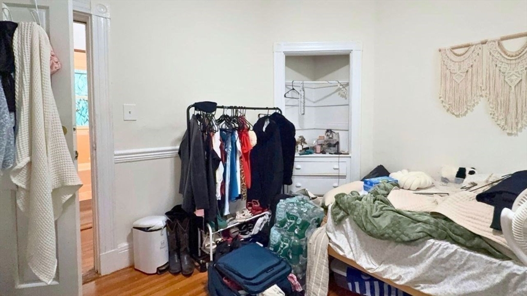 26 Darling Street, Unit 2 Boston, MA 02120 - Photo 12 of 25 a living room with furniture and a painting on the wall