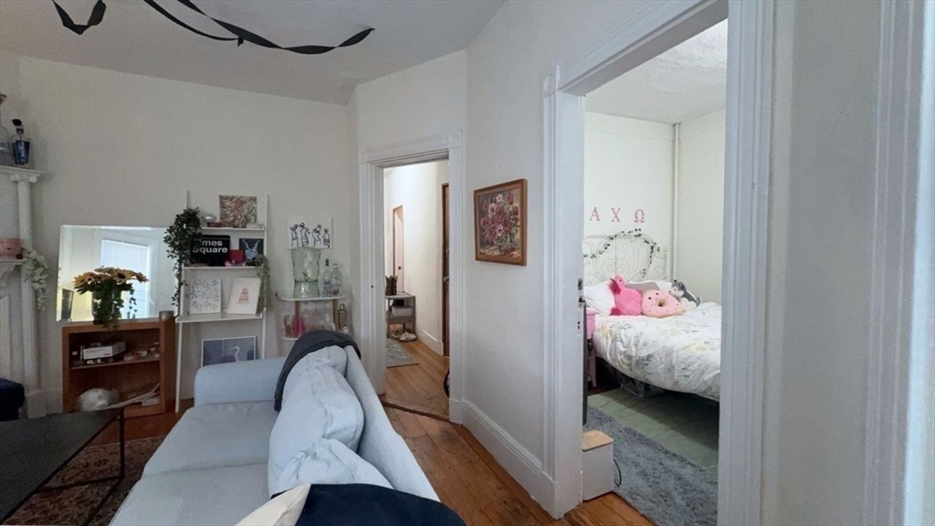 26 Darling Street, Unit 2 Boston, MA 02120 - Photo 18 of 25 a en suite bathroom with a granite countertop sink and a mirror