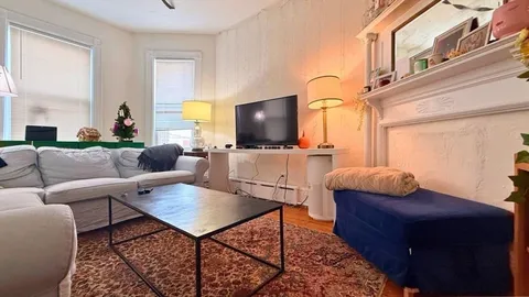 a living room with furniture and a couch