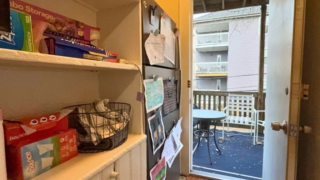 26 Darling Street, Unit 2 Boston, MA 02120 - Photo 22 of 25 walk in closet with wooden floor