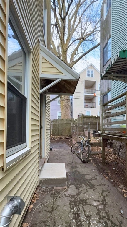26 Darling Street, Unit 2 Boston, MA 02120 - Photo 25 of 25 a view of a back yard of the house