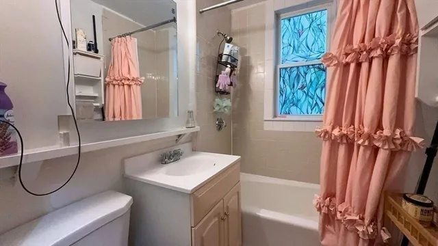 a bathroom with a sink a vanity and a mirror