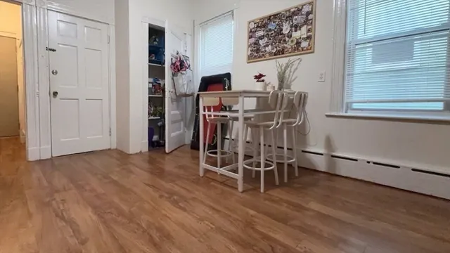 a bedroom with a bed and a table in it