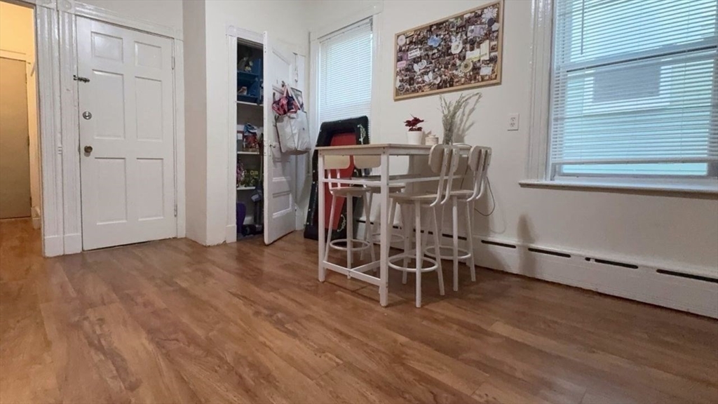 26 Darling Street, Unit 2 Boston, MA 02120 - Photo 7 of 25 a view of a workspace with wooden floor