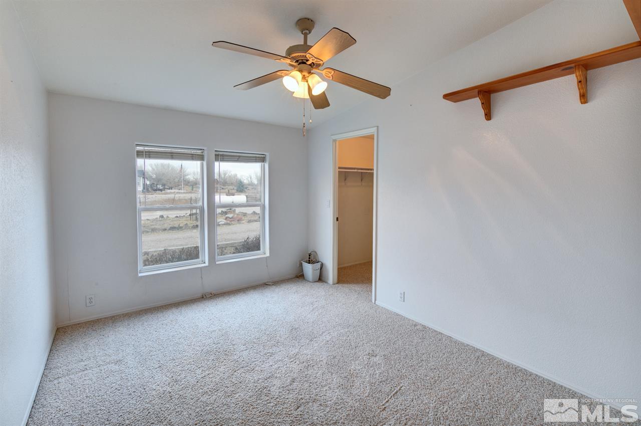 5396 Cody Road Fallon, NV 89406 - Photo 13 of 24 a view of an empty room with a window