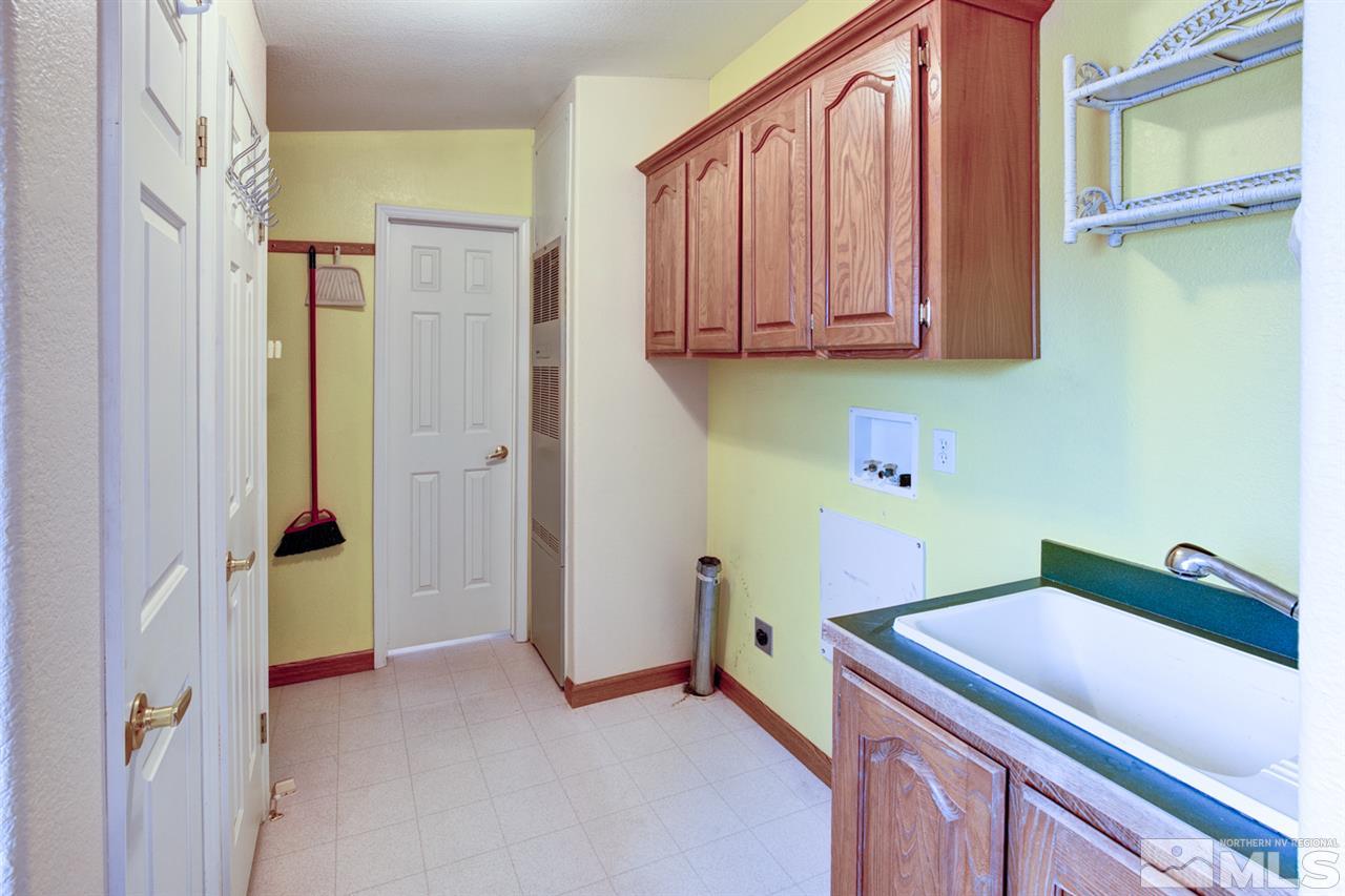 5396 Cody Road Fallon, NV 89406 - Photo 19 of 24 a view of a storage and utility room with a sink