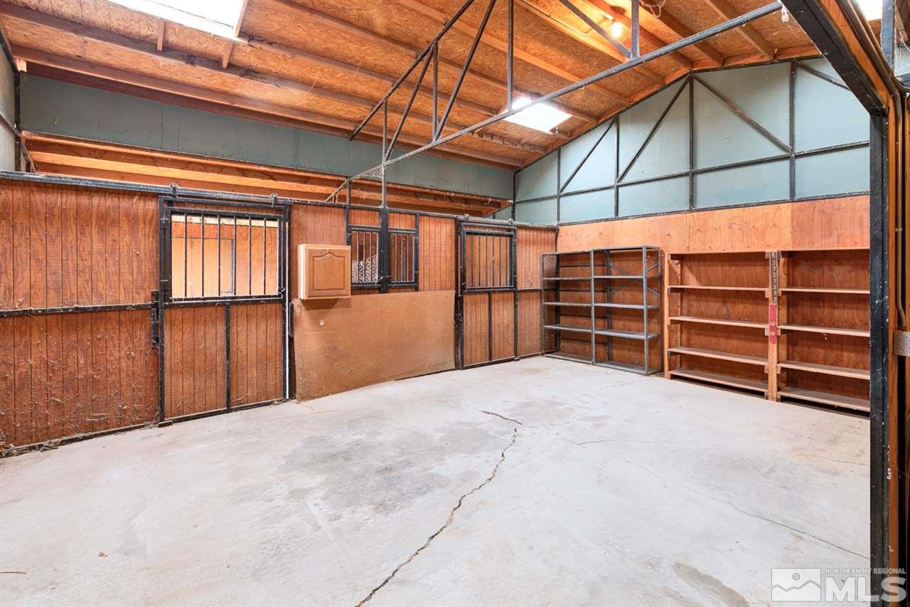 5396 Cody Road Fallon, NV 89406 - Photo 21 of 24 a view of an empty room with furniture and a window
