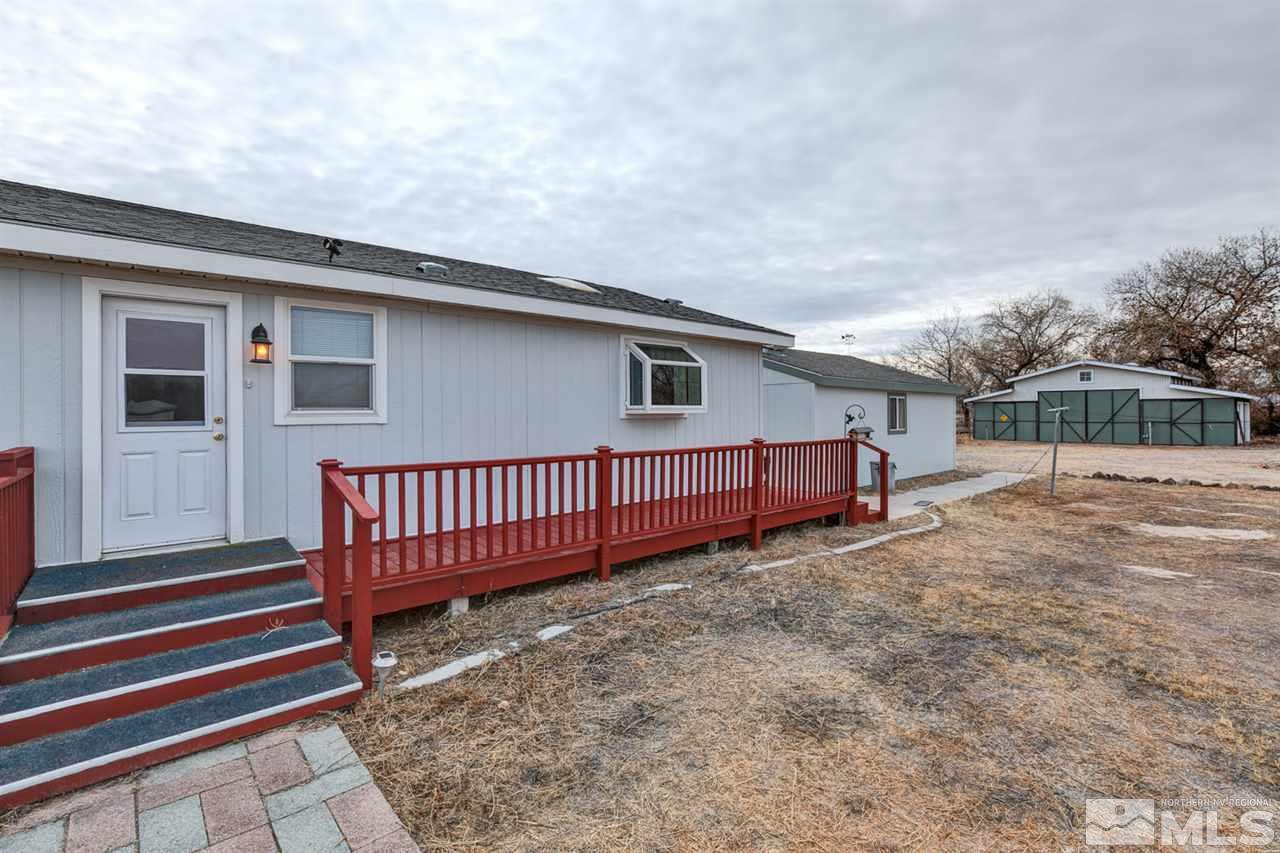 5396 Cody Road Fallon, NV 89406 - Photo 23 of 24 a view of a house with a yard and fence