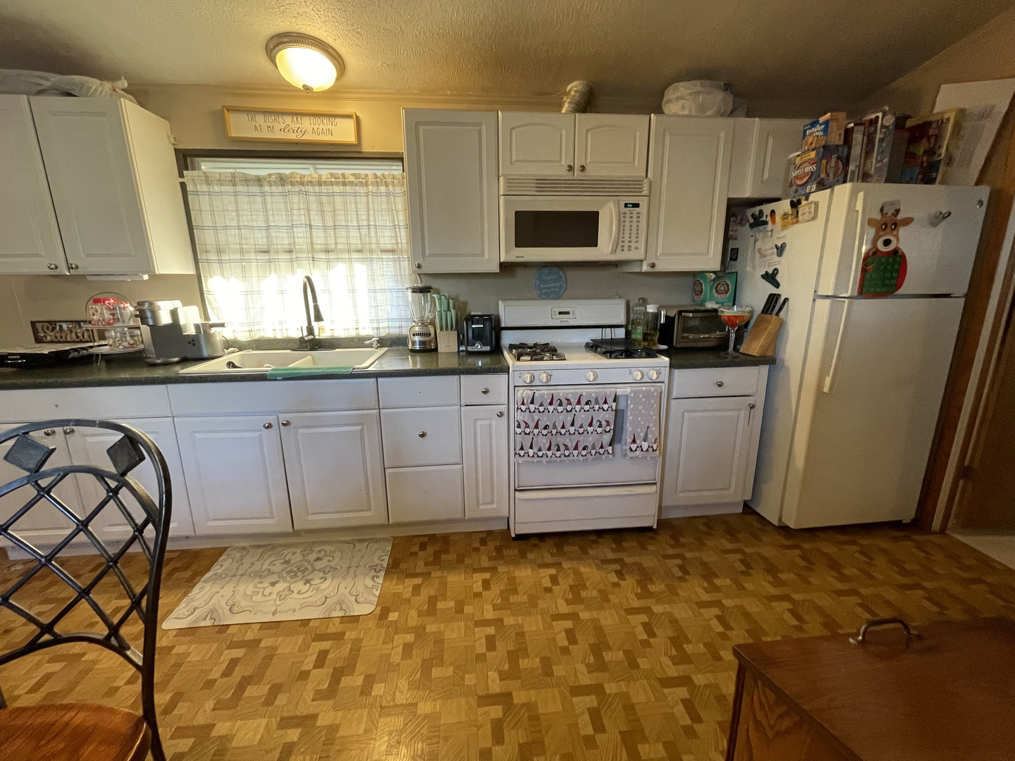 657 Huntsbridge Road Matteson, IL 60443 - Photo 2 of 8 a kitchen with stainless steel appliances granite countertop a stove a sink dishwasher and a refrigerator