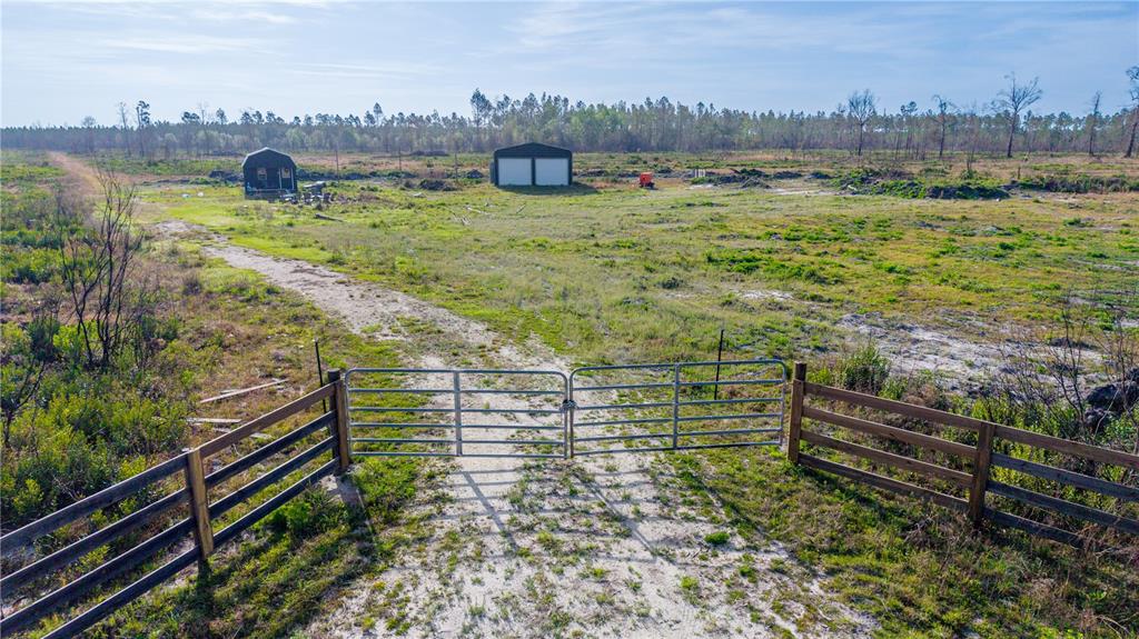 0 Southwest 83rd Way Gainesville, FL 32609 - Photo 17 of 24 a view of a yard with an outdoor seating
