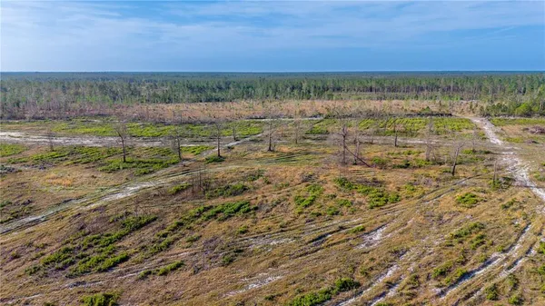 a view of an outdoor space with mountain view