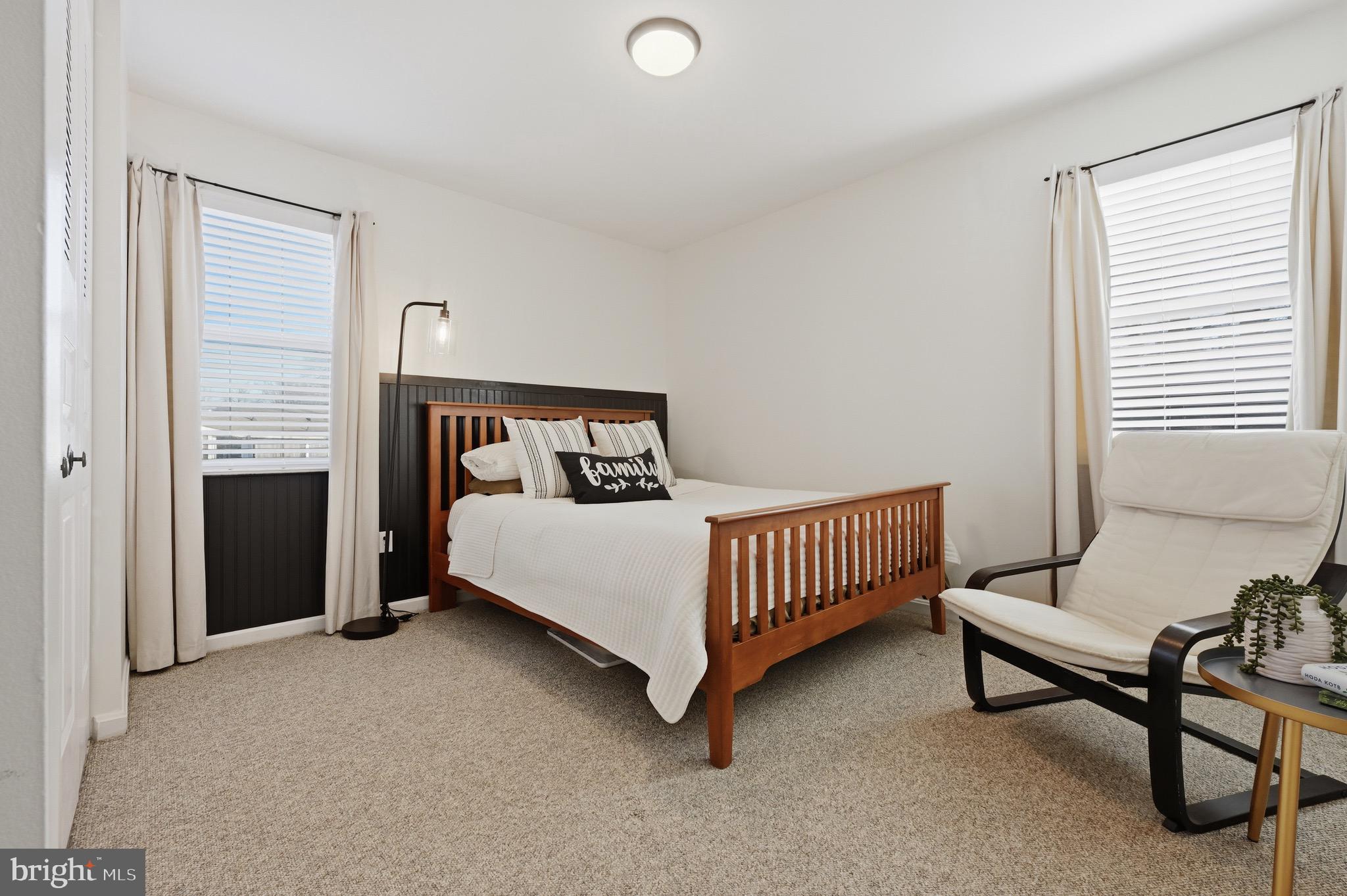 1707 Millstone Drive Edgewater, MD 21037 - Photo 19 of 39 a bedroom with a bed and a window
