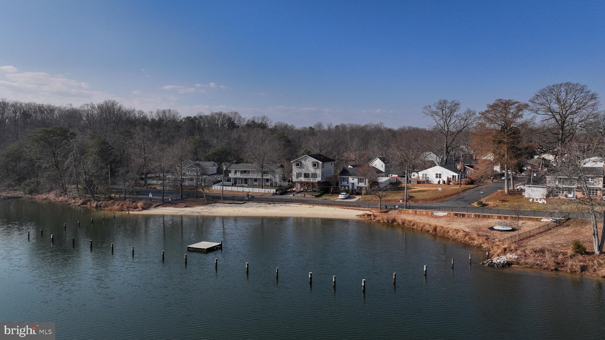 1707 Millstone Drive Edgewater, MD 21037 - Photo 28 of 39 a view of a lake with a mountain