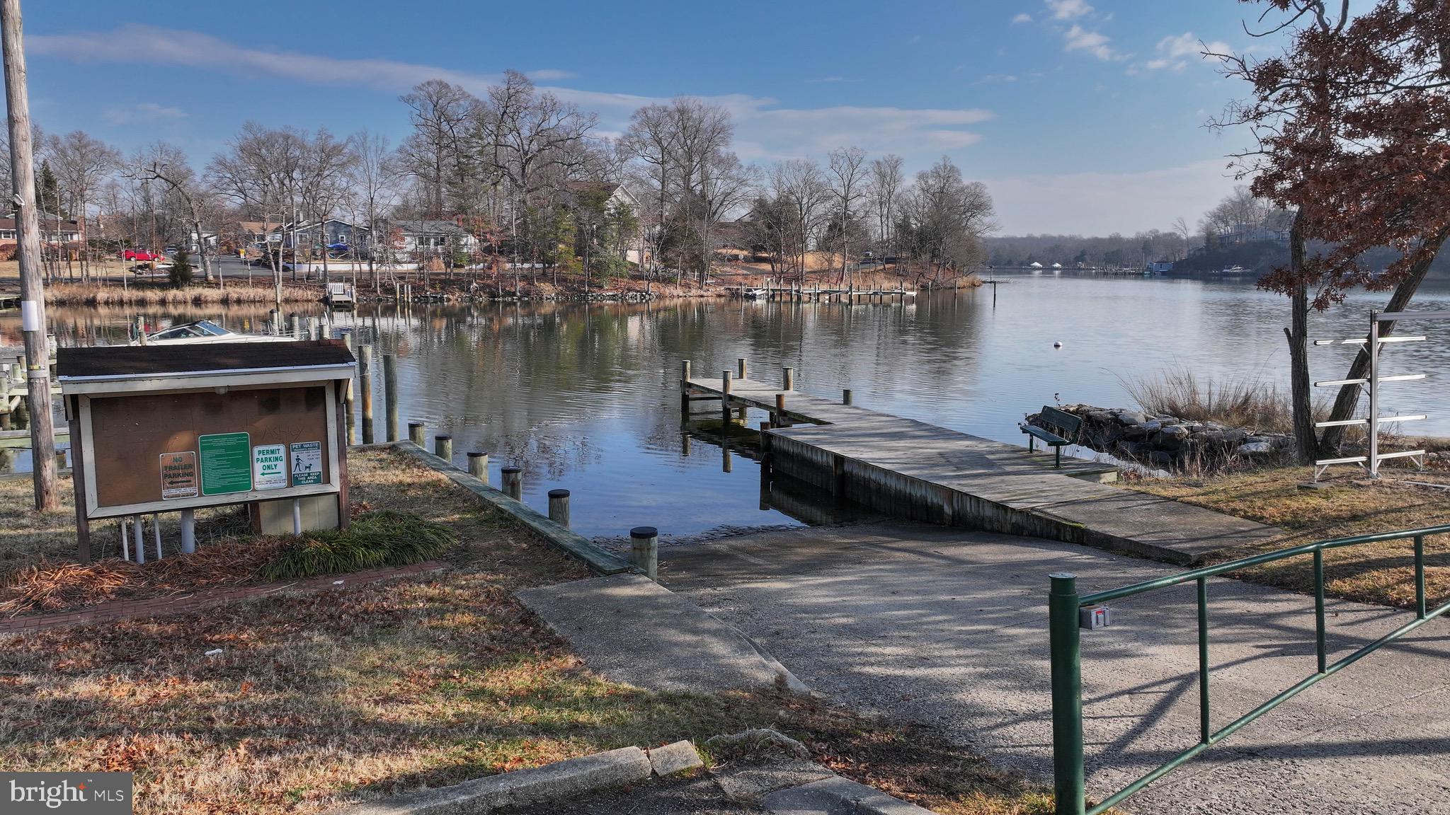 1707 Millstone Drive Edgewater, MD 21037 - Photo 32 of 39 a backyard of a house with a yard and outdoor seating