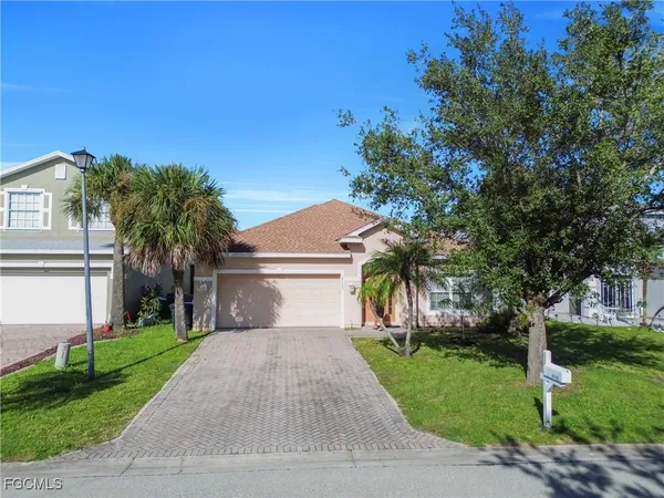 an aerial view of a house with a garden