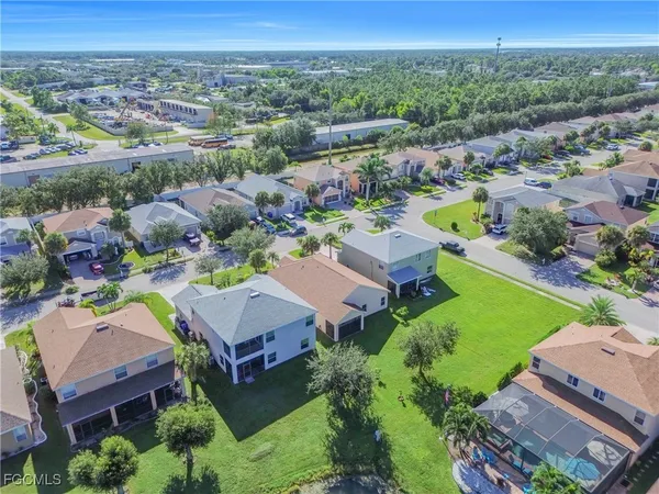 an aerial view of a city with lots of residential buildings